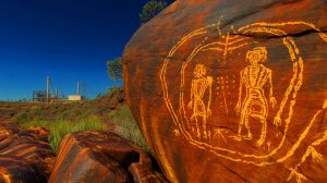 Illustration de la lutte des Aborigènes pour la protection du site de Murujuga, générée par intelligence artificielle.